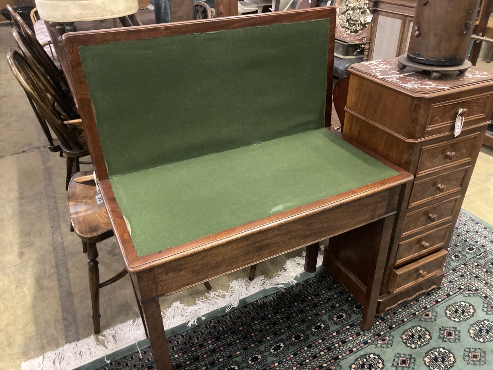 A George III mahogany folding rectangular card table, width 90cm depth 44cm height 74cm